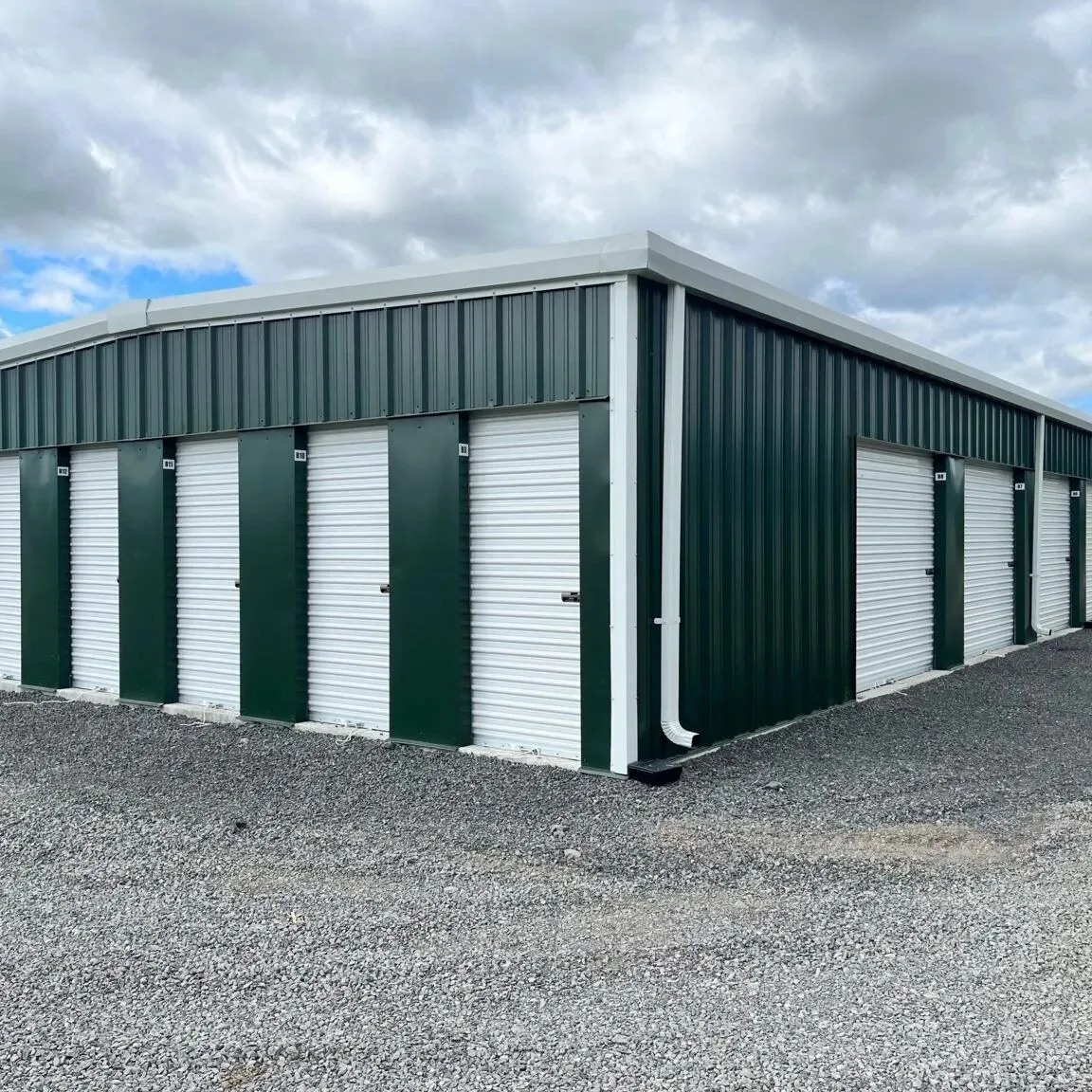 Steel mini-storage building with roll-up doors
